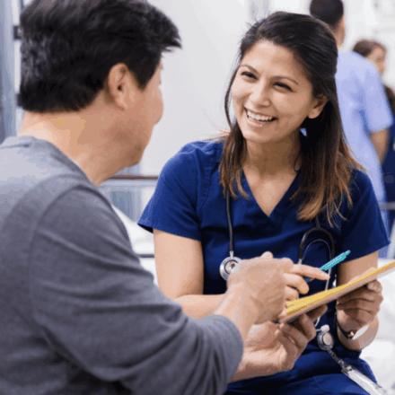 A patient discusses results with a nurse