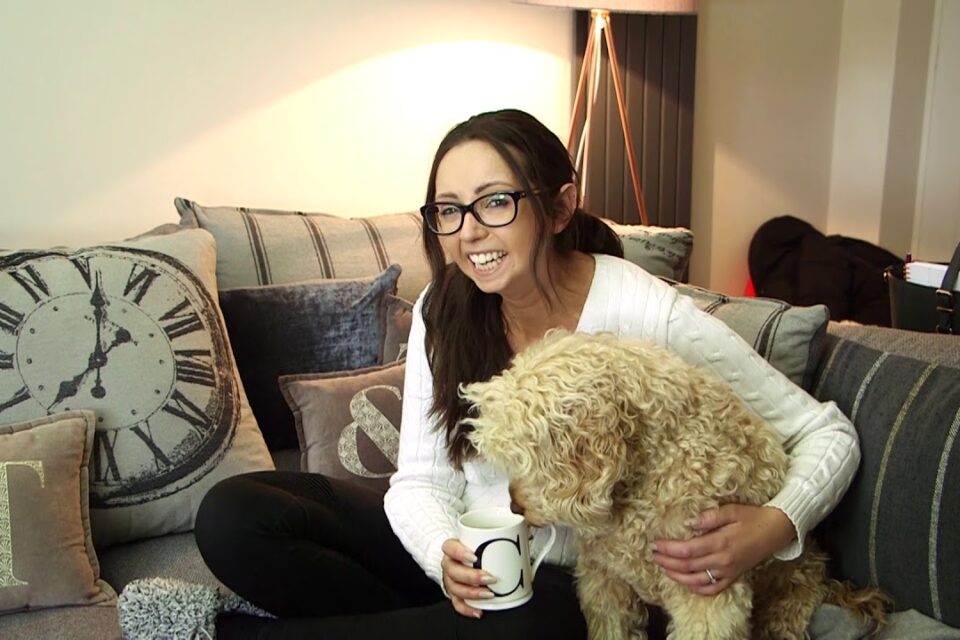 Chloe holding her dog