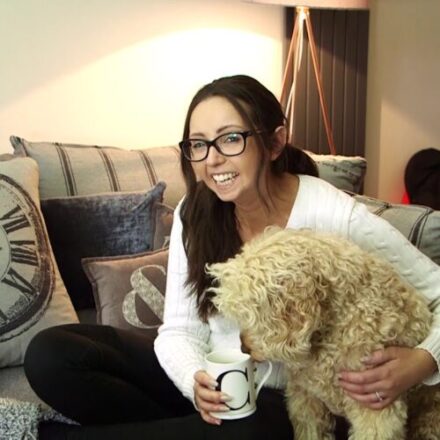 Chloe holding her dog